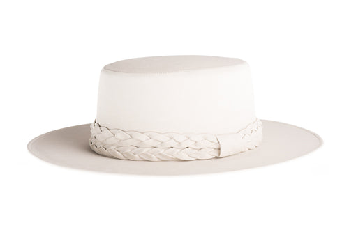 White vegan leather hat cordobes style with double braided trim, left side view